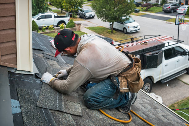 Professional Flat Roof Repair technician working in Lowell, VT